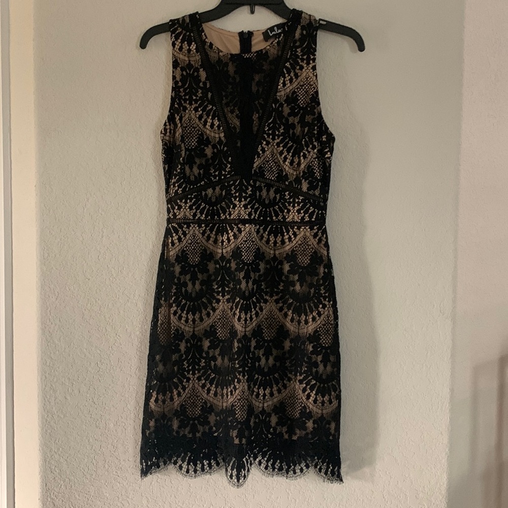 Mini black dress with lace details